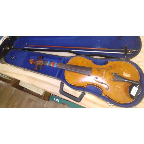 234 - A 20th century student violin with bow and hard case.