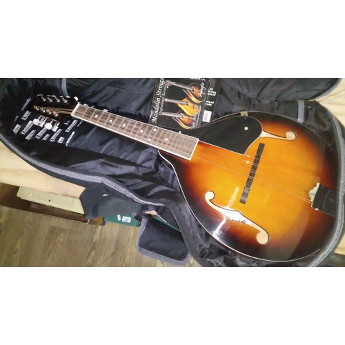 232 - A Republic mandolin with soft bag.