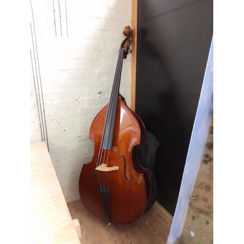 297 - A Stentor 3/4 double bass, solid back and front, with soft bag.