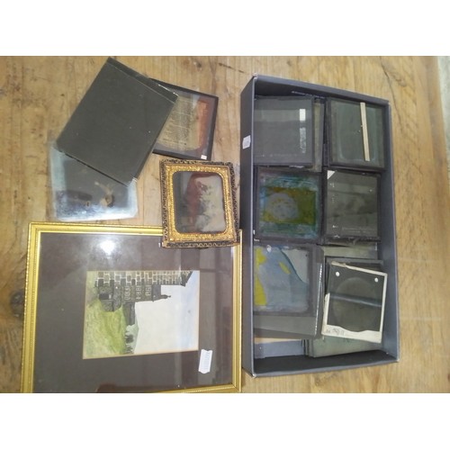 288 - A collection of magic lantern glass slides, old photorgraphs and wateroclour.