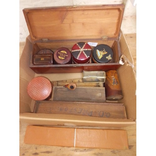 290 - A box of assorted items including a leather cased medicine glass, treem, dominoes, rules, etc.