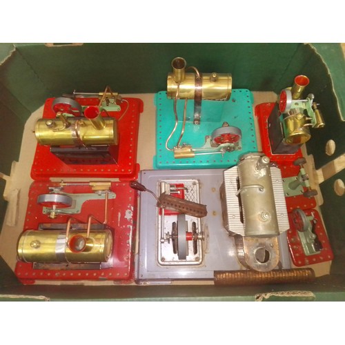 324 - A box of assorted stationary live steam models comprising four Mamod engines and two accessories and... 