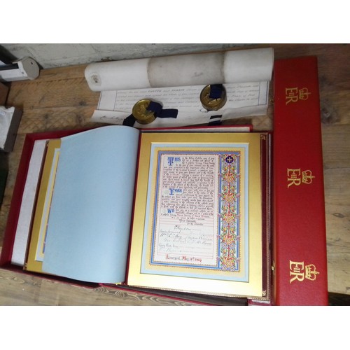 270 - A Catholic Young Men's Society illuminated document and a velum indenture with wax seals and housed ... 