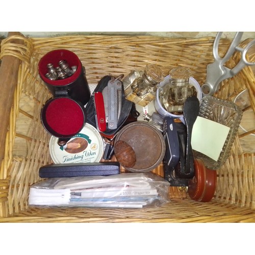 267 - A basket of assorted items cinluding a coquilla nut, whistles, penkknives, ink wells etc. etc.