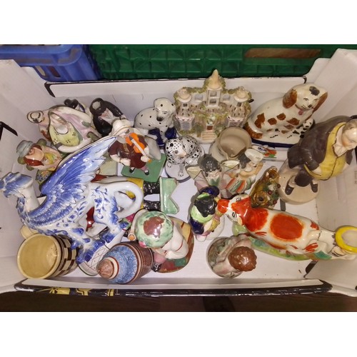 169 - A box of mainly Staffordshire pottery figures.