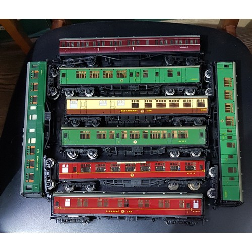 393 - A box of assorted toys including Corgi and other die-cast models and 00 gauge model railway carriage... 