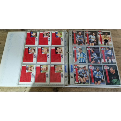 459 - An album containing 420 Pro Set football collectors cards comprising two full sets.