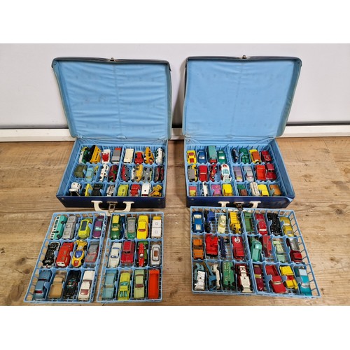 443 - Two matchbox cases and vehicles