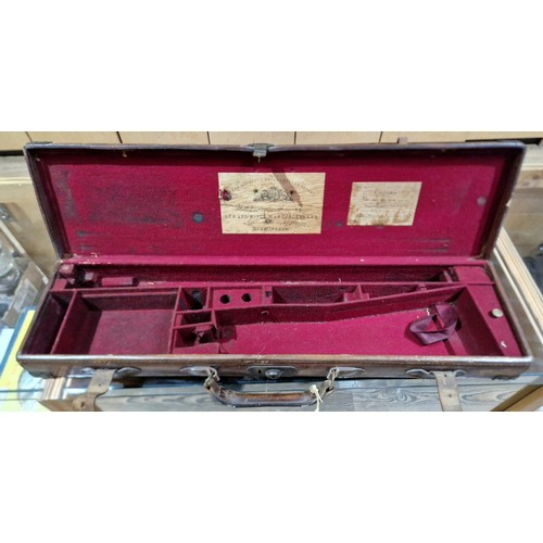 258 - Five gun cases comprising a leg of mutton leather case, a Holland & Holland, two William Powell & So... 