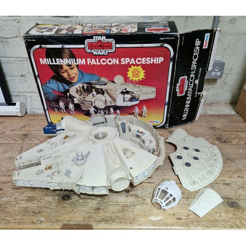 334 - Three large boxed toys comprising Star Wars AT-AT, Star Wars Millenium Falcon and a TCR raceway.