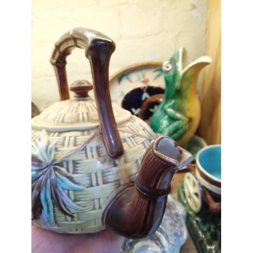 23 - Assorted Majolica including a Bordallo Pinheiro style oyster clam dish, couple pulling a cart etc., ... 