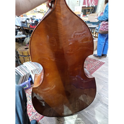 297 - A Stentor 3/4 double bass, solid back and front, with soft bag.