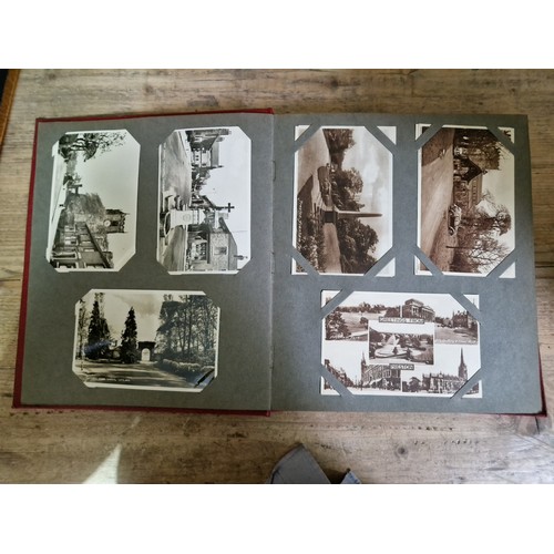 274 - Two albums of postcards, early 20th century, various subject matter, including Lake District etc., e... 