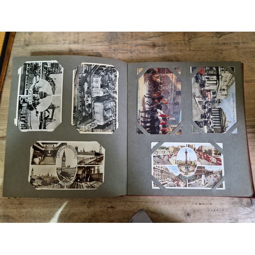 274 - Two albums of postcards, early 20th century, various subject matter, including Lake District etc., e... 