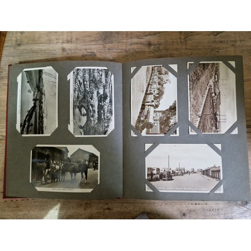 274 - Two albums of postcards, early 20th century, various subject matter, including Lake District etc., e... 