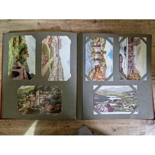 274 - Two albums of postcards, early 20th century, various subject matter, including Lake District etc., e... 