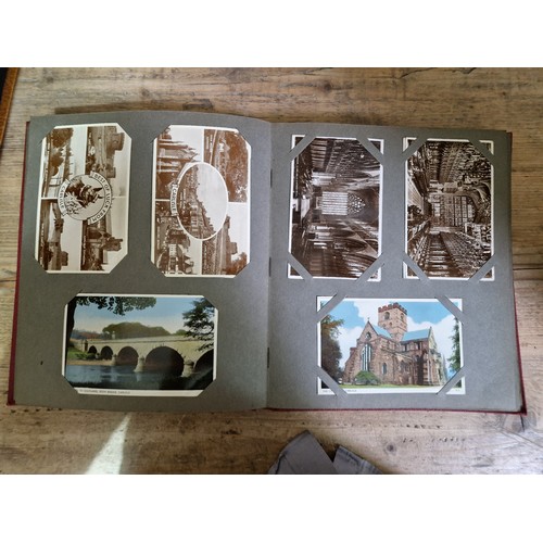 274 - Two albums of postcards, early 20th century, various subject matter, including Lake District etc., e... 