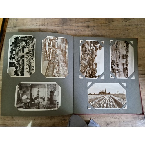 274 - Two albums of postcards, early 20th century, various subject matter, including Lake District etc., e... 