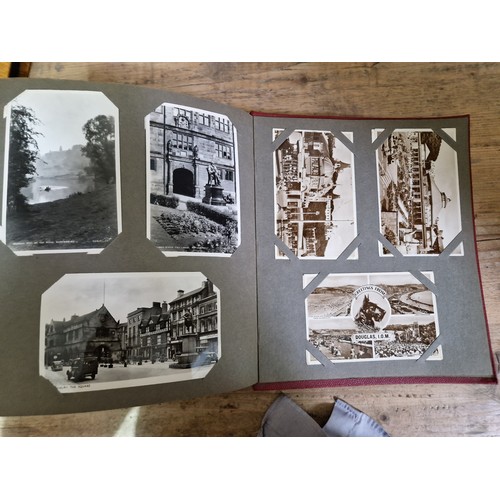 274 - Two albums of postcards, early 20th century, various subject matter, including Lake District etc., e... 