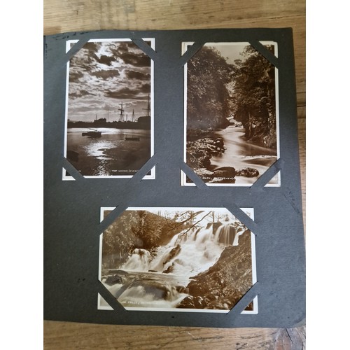 274 - Two albums of postcards, early 20th century, various subject matter, including Lake District etc., e... 