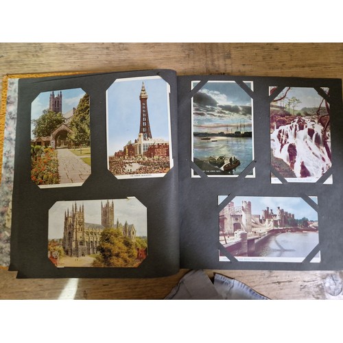 274 - Two albums of postcards, early 20th century, various subject matter, including Lake District etc., e... 