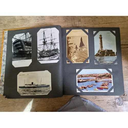 274 - Two albums of postcards, early 20th century, various subject matter, including Lake District etc., e... 