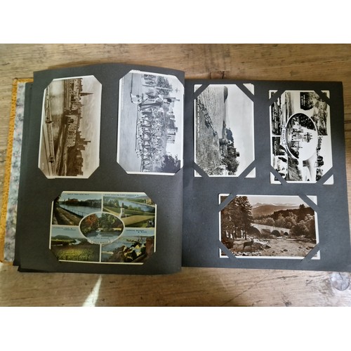 274 - Two albums of postcards, early 20th century, various subject matter, including Lake District etc., e... 