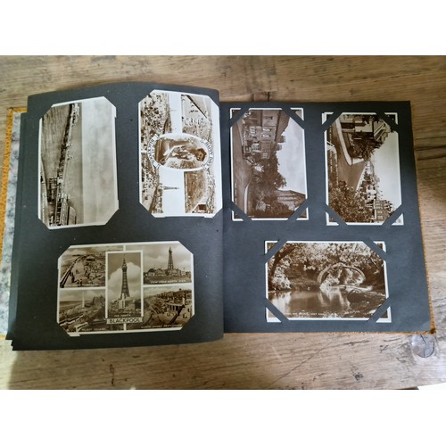 274 - Two albums of postcards, early 20th century, various subject matter, including Lake District etc., e... 