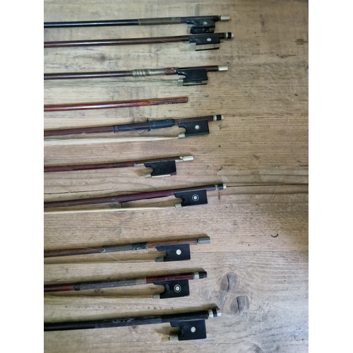 236 - Assorted violins, bows and cases, spares and repairs.