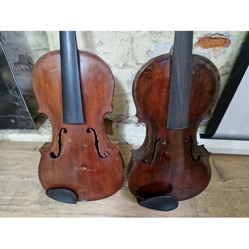 237 - Five assorted violins, spares and repairs.