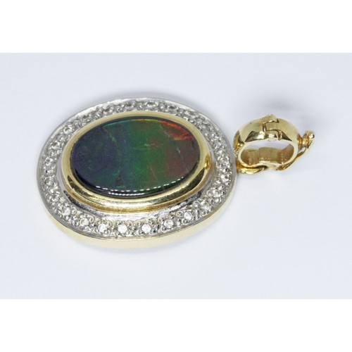 35 - An ammolite and diamond pendant, marked '18K', length (including clasp) 32mm, gross wt. 4.9g.