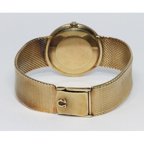 65 - A 9ct gold Omega wristwatch, circa 1960s, case diam. 32mm, with 9ct smooth link bracelet strap, gros... 