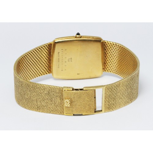 94 - An 18ct gold Seiko wristwatch, case width 26mm, with 18ct textured gold strap, gross wt. 77.4g.