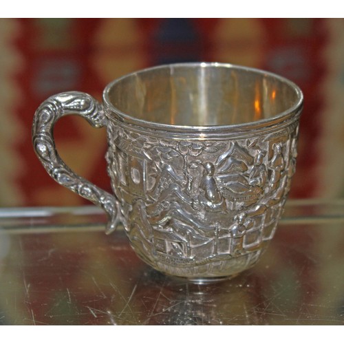 158 - A Chinese export silver teacup, decorated all over with a village scene, Wang Hing & Co, height 6.5c... 