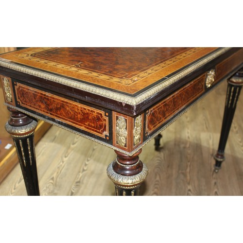 162 - A fine Louis XVI style card table, the amboyna and burr walnut top with parquetry inlay and ebonised... 