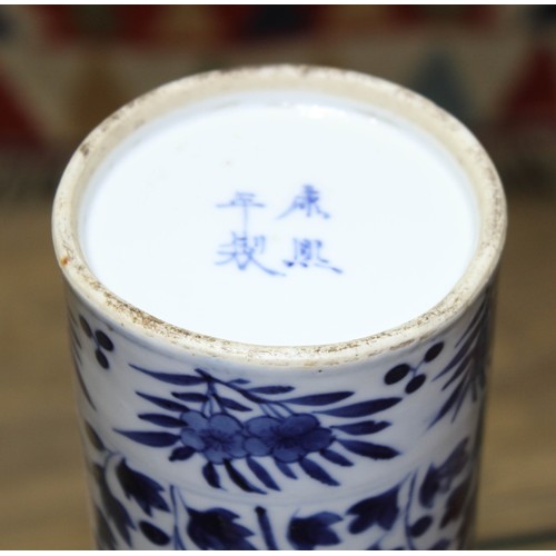 145 - A Chinese porcelain sleeve vase, decorated in underglaze blue with exotic birds and flowers, four ch... 