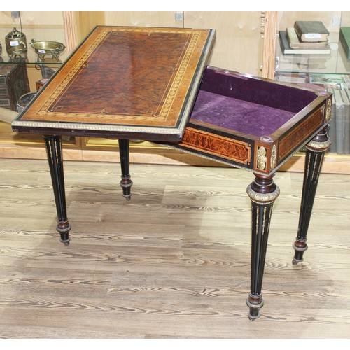 162 - A fine Louis XVI style card table, the amboyna and burr walnut top with parquetry inlay and ebonised... 