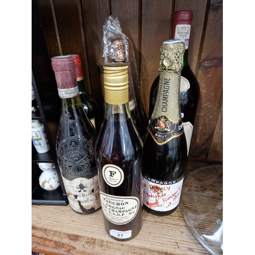 21 - Six bottles of alcoholic beverages including two bottles of Champagne (one Rose), three bottles of w... 