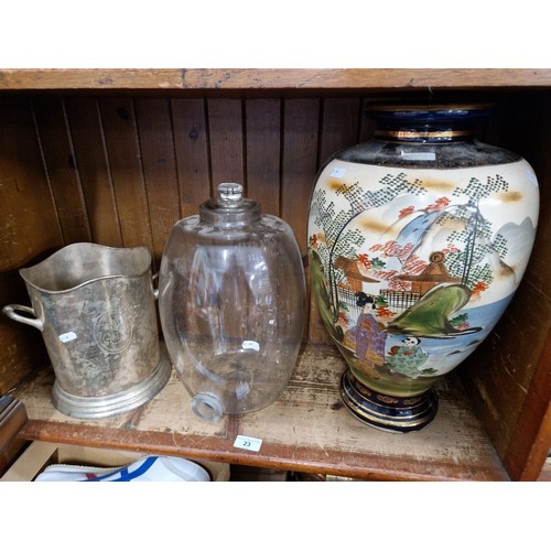 23 - A plated Louis Roeder Champagne ice bucket, a large Oriental vase and a glass pharmacy dispensing ja... 