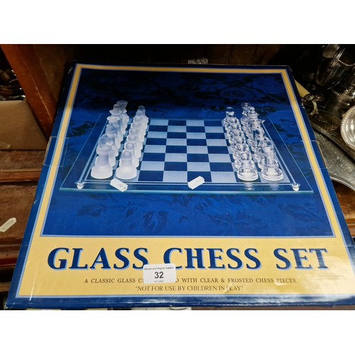 32 - A boxed Glass Chess Set