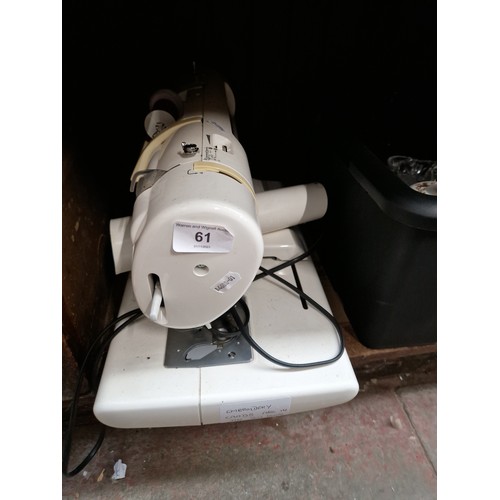 61 - A Brother embroidery machine, model PE-150.