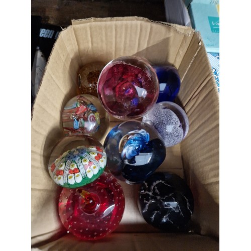 53 - Nine glass paperweights including Caithness and Strathearn Millefiori.
