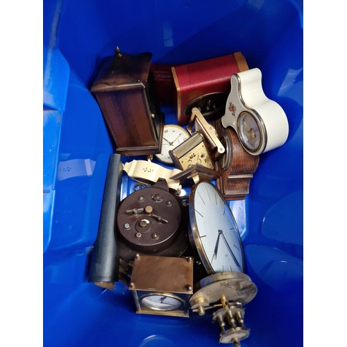 69 - A box of various types of small clocks, travel, alarm and carriage