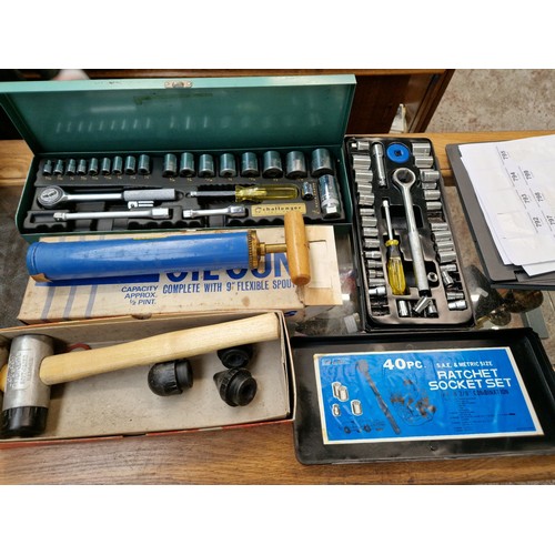 62 - Two socket sets, a boxed Halfords Oil Gun and a boxed Soft Faced hammer set