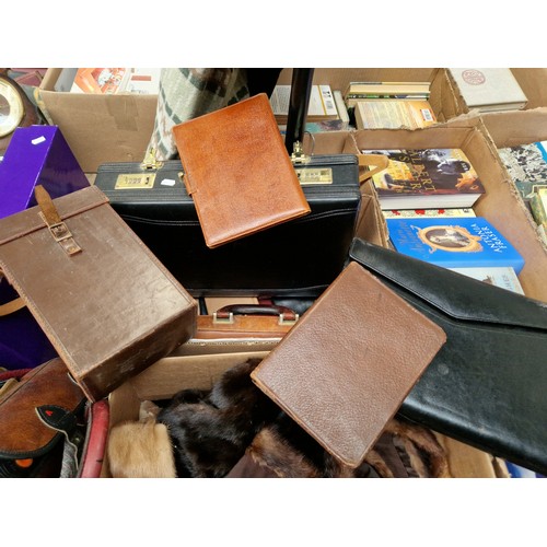 84 - A box with a leather briefcase, leather instrument case, wallets, attached case etc