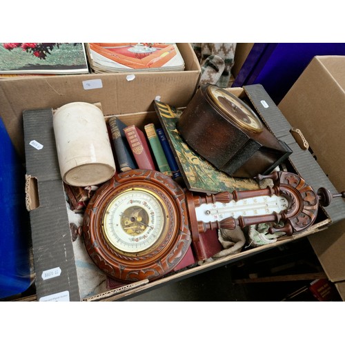 99 - A box of assorted items including a clock, a barometer, pottery, books etc.