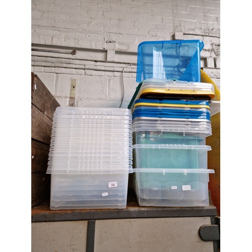 156 - A quantity of plastic boxes.