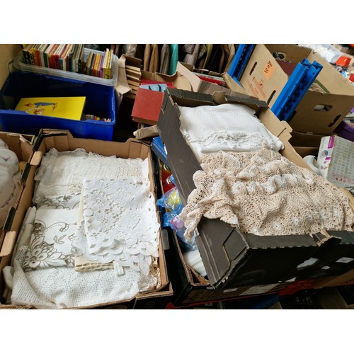 142 - Two boxes of vintage linen and lace.