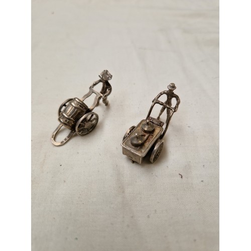 799C - A pair of Dutch silver miniature models.