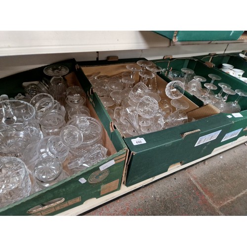 692 - Three boxes of glass ware including decanters, jugs, drinking glasses, vases etc